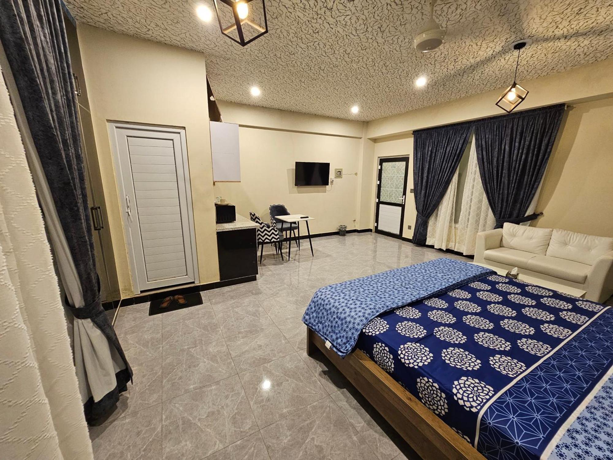Motorway Majesty Suites Islamabad - Near Islamabad International Airport And Motorway Habitación foto